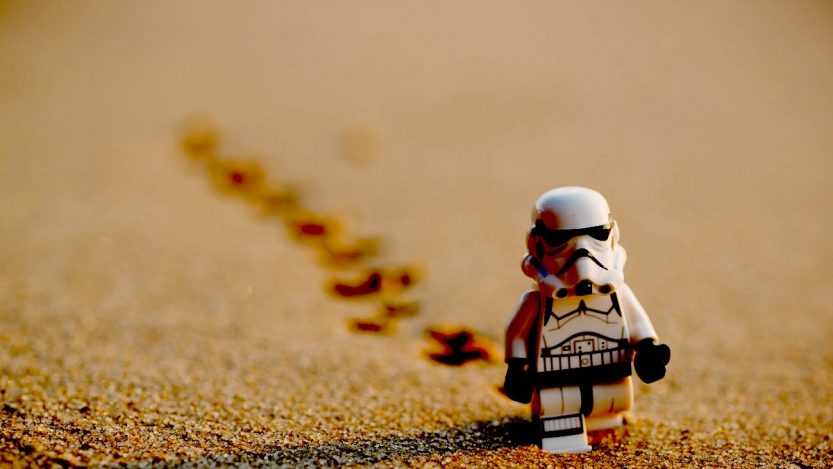 Lego Storm Trooper walking in the desert